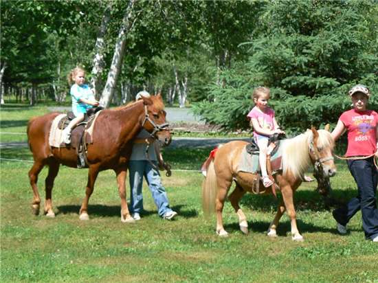 Deanna Nordin and Amy Walls on the pony rides.